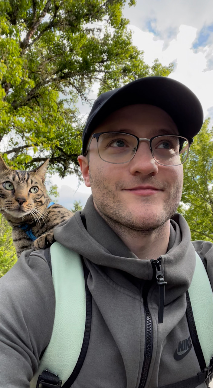 A photo and Chris and his cat Drew